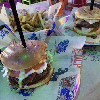River City Cafe - Black N Blue Burger and Peanut Butter Banana Burger with a basket of fries - American Near Me - Myrtle Beach, South Carolina