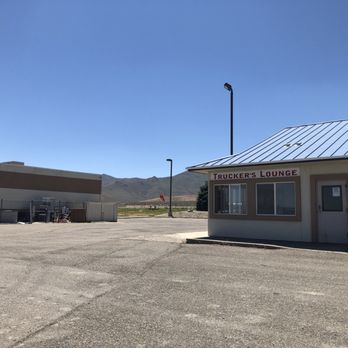 Chevron - an empty parking lot with a building in the background - Gas Stations Near Me - Winnemucca, Nevada Chevron - an empty parking lot with a building in the background - Gas Stations Near Me - Winnemucca, Nevada