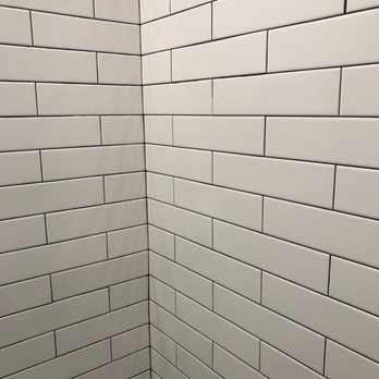A Better Home Services - Compare grout line to other wall. - General Contractors Near Me - Grapevine, Texas A Better Home Services - Compare grout line to other wall. - General Contractors Near Me - Grapevine, Texas
