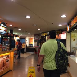 Time Square Food Court - Food stalls line the food court hallway.