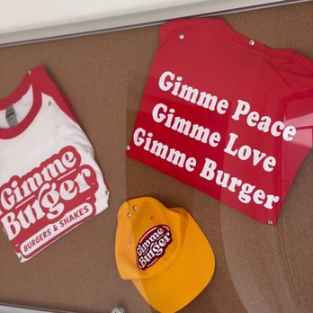 Gimme Burger - a t - shirt, cap, and t - shirt displayed on a bulletin board - Burgers Near Me - Oyster Bay, New York Gimme Burger - a t - shirt, cap, and t - shirt displayed on a bulletin board - Burgers Near Me - Oyster Bay, New York