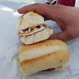Corned beef and ham sandwich on a hoagie roll Corned beef and ham sandwich on a hoagie roll