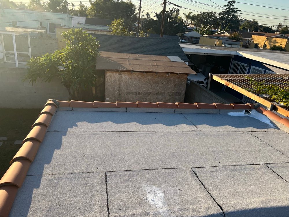 Slide of JMT Roofing