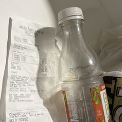Lonestar Souvenir & Food Mart - Receipt and expired tea bottle