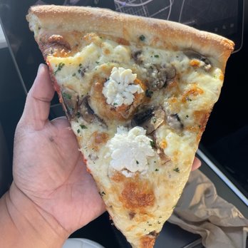 Raymond's Pizzeria - McMushroom NY style slice. If you love truffles this is it! Oozes flavor! - Pizza Near Me - Richmond, California Raymond's Pizzeria - McMushroom NY style slice. If you love truffles this is it! Oozes flavor! - Pizza Near Me - Richmond, California