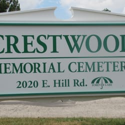 Crestwood Memorial Cemetery - Under the umbrella graphic on the sign it says "forever care"......it should read......'DON'T CARE"