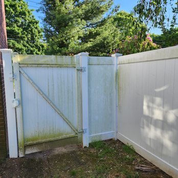 Ned Stevens Gutter Cleaning - Fence Before - Gutter Services Near Me - Brentwood, New York Ned Stevens Gutter Cleaning - Fence Before - Gutter Services Near Me - Brentwood, New York