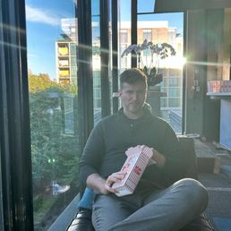 Enjoying popcorn in the lobby waiting for the show.
