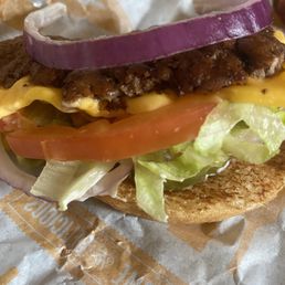 The onion is thicker than the patty