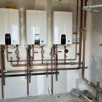 Plumbing Pros - The start of a triple tankless installation - Plumbing Near Me - Downers Grove, Illinois