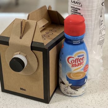 Top Donuts - a coffee machine and a cup of coffee - Donuts Near Me - Wilmington, California Top Donuts - a coffee machine and a cup of coffee - Donuts Near Me - Wilmington, California