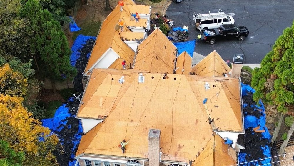 Slide of DIM Construction and Roofing