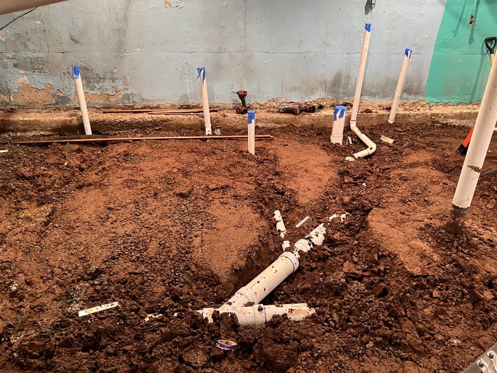 Slide of Family Drain Cleaning