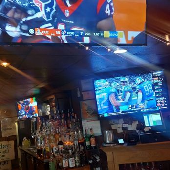 Randy's Fireside - a man watching a football game on tv - Bars Near Me - Olean, New York Randy's Fireside - a man watching a football game on tv - Bars Near Me - Olean, New York
