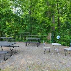 Donatello's With A Twist - Outdoor seating by the creek