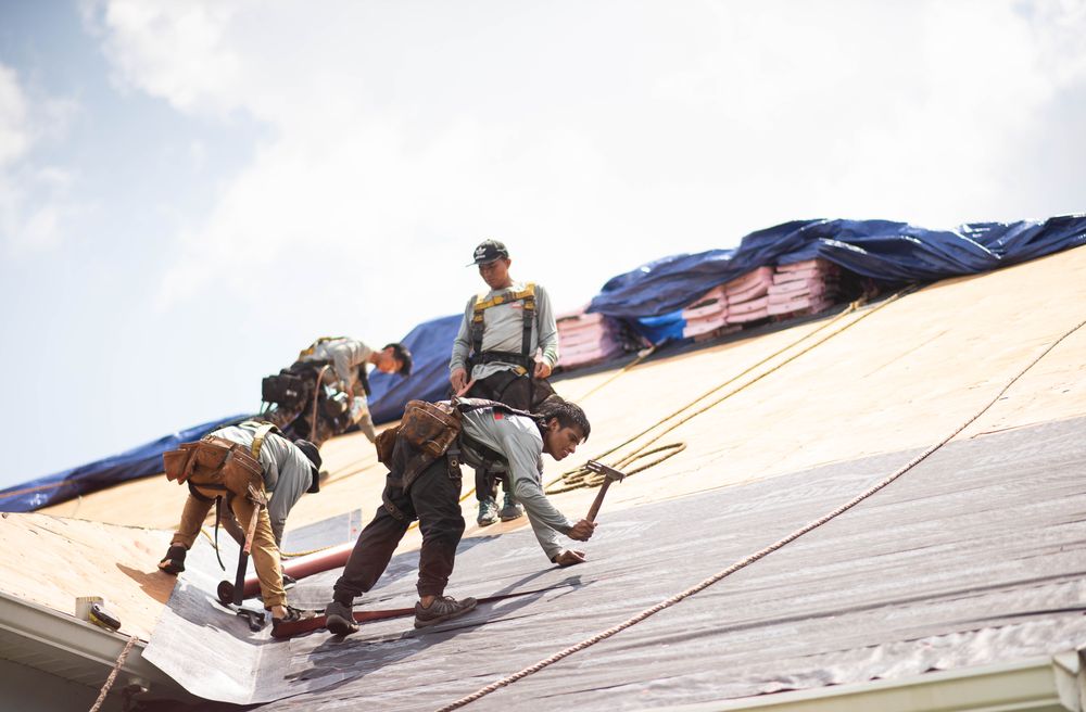 Slide of J Adams Roofing