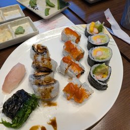 seaweed salad sushi, volcano roll, futo maki roll seaweed salad sushi, volcano roll, futo maki roll