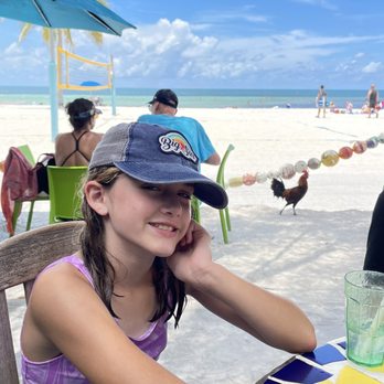 Salute On The Beach - Daughter and rooster in situ - Italian Near Me - Key West, Florida Salute On The Beach - Daughter and rooster in situ - Italian Near Me - Key West, Florida