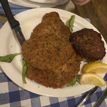 Black Forest Inn - Pork Schnitzel and the hockey puck potato pancake. It looks like a hamburger patty but it's not! - German Near Me - Minneapolis, Minnesota Black Forest Inn - Pork Schnitzel and the hockey puck potato pancake. It looks like a hamburger patty but it's not! - German Near Me - Minneapolis, Minnesota