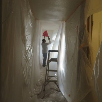 Henrik Plumbing - After patching, he is texturing the ceiling. - Plumbing Near Me - Los Angeles, California Henrik Plumbing - After patching, he is texturing the ceiling. - Plumbing Near Me - Los Angeles, California