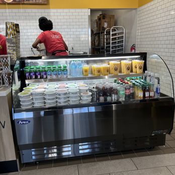 Einstein Bros. Bagels - Fridge case with schmears and beverages to go - Breakfast & Brunch Near Me - Fullerton, California