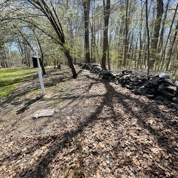 Riverwood Groundskeeping - Leaf Cleanup Before - Lawn Services Near Me - Cheshire, Connecticut Riverwood Groundskeeping - Leaf Cleanup Before - Lawn Services Near Me - Cheshire, Connecticut