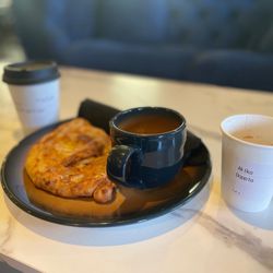 lil Coffea Shop - Chicken Masala Calzone with my doppio to the right and spiced apple chai to the left