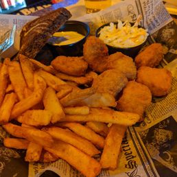 Battered cod bites with fries and coleslaw Battered cod bites with fries and coleslaw