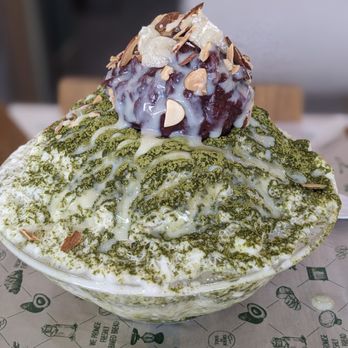 Tous Les Jours - Green Tea Korean Bingsu (Shaved Ice) with condensed milk, sweet red beans, mochi bites and sliced almonds - Bakeries Near Me - Dublin, California Tous Les Jours - Green Tea Korean Bingsu (Shaved Ice) with condensed milk, sweet red beans, mochi bites and sliced almonds - Bakeries Near Me - Dublin, California