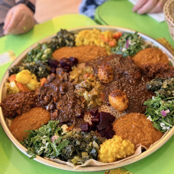 Lucy Ethiopian Restaurant - The vegan combo for 2 & the meat combo for 2 - Ethiopian Near Me - Los Angeles, California Lucy Ethiopian Restaurant - The vegan combo for 2 & the meat combo for 2 - Ethiopian Near Me - Los Angeles, California