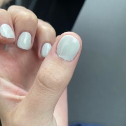 Stellar Nails and Spa - Visible black hair.