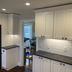 R & N Builders - Kitchen renovation with subway tile backsplash and undercabinet lighting
