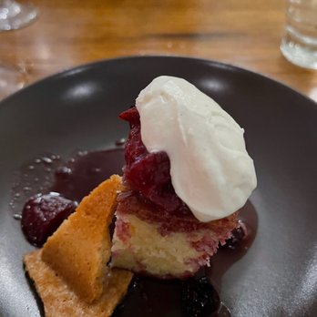 Eighty Acres Kitchen & Bar - Strawberry lemon sponge cake with berry compote, whipped cream, and feuilletine. - Bars Near Me - Pittsburgh, Pennsylvania Eighty Acres Kitchen & Bar - Strawberry lemon sponge cake with berry compote, whipped cream, and feuilletine. - Bars Near Me - Pittsburgh, Pennsylvania