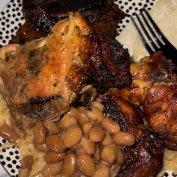 El Pollo Dorado - Chicken and ribs with rice and beans splits from the 1/2 chicken platter and the rib platter. - Mexican Near Me - Wichita, Kansas El Pollo Dorado - Chicken and ribs with rice and beans splits from the 1/2 chicken platter and the rib platter. - Mexican Near Me - Wichita, Kansas