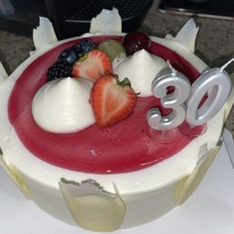 Cassis Cake (sponge cake, whipped cream with pineapple layer, whipped cream frosting, berry glaze on top)