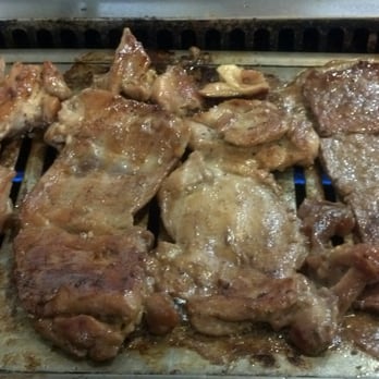 Sik Do Rak - Cooked BBQ chicken/kalbi, more uncooked kalbi on the side. - Korean Near Me - Honolulu, Hawaii