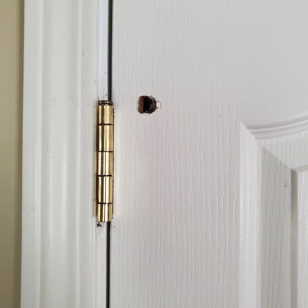AMH - Hole in door - Property Management Near Me - Norcross, Georgia