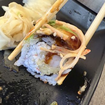 Yo Sushi - Cross section of Awesome roll (i ate some of the crab from the top already ) - Japanese Near Me - Pinole, California