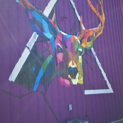 Who Loves Ya Baby - More mural on the right side of the building. (in progress)