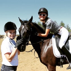 Mega Arte Riding Academy - Student Jordan with rescue mare Jazzy and trainer Meg warming her up for her 1st big show:))