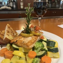 Sports Page Grill - Salmon dinner.  Texas style proportions.  You won't leave hungry.