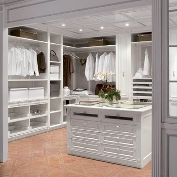 Florida Custom Closets, Kitchen & Bath - Custom White Closet with Glass Top Island - Home Organization Near Me - Neptune Beach, Florida Florida Custom Closets, Kitchen & Bath - Custom White Closet with Glass Top Island - Home Organization Near Me - Neptune Beach, Florida