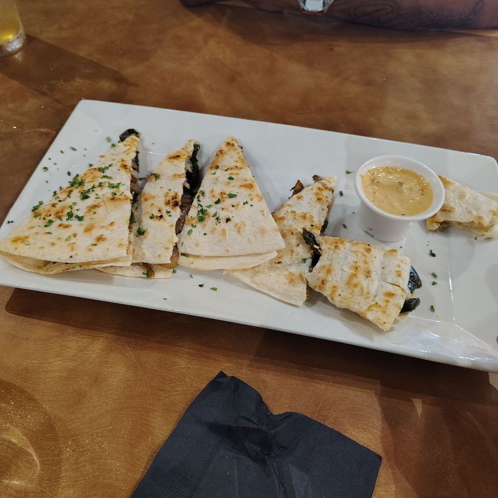 Brick Restaurant - Prime rib pepper carbaccio quesadilla - New American Near Me - Jacksonville, Florida Brick Restaurant - Prime rib pepper carbaccio quesadilla - New American Near Me - Jacksonville, Florida
