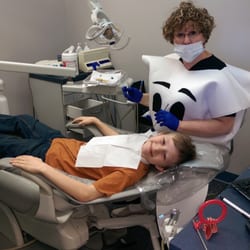 Century Dental - One of our volunteer hygienist, Pat, helping to alleviate patient fears with a healthy dose of dental humor.