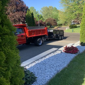 ABC Property Care - a dump truck parked in a driveway - Landscaping Near Me - South Windsor, Connecticut ABC Property Care - a dump truck parked in a driveway - Landscaping Near Me - South Windsor, Connecticut