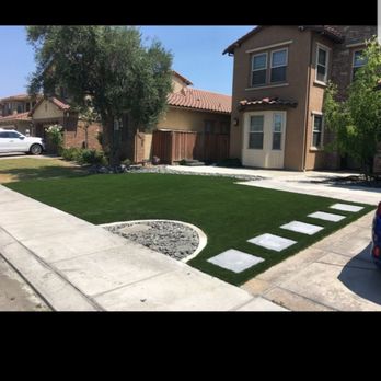Absolute Stone Pavers - Turf and stepping stones - Masonry/Concrete Near Me