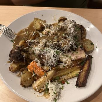 Waverly Stone - Braised short rib with potatoes and carrots - Mediterranean Near Me - Holland, Michigan Waverly Stone - Braised short rib with potatoes and carrots - Mediterranean Near Me - Holland, Michigan