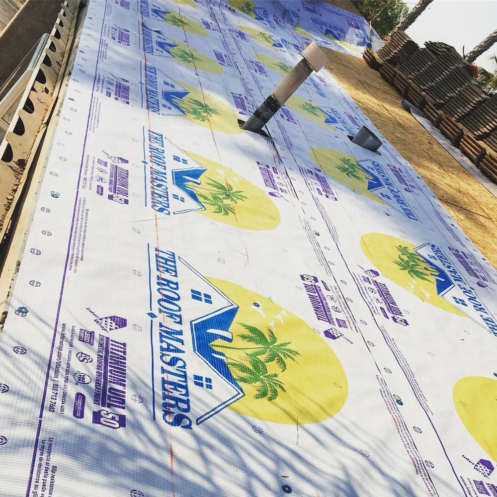 Slide of The Roof Masters