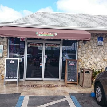 Micelis Waterfront Restaurant - Outside view. - Italian Near Me - Matlacha, Florida Micelis Waterfront Restaurant - Outside view. - Italian Near Me - Matlacha, Florida