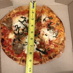 This is how big for a 29.00 pizza. Crazy. Freezing cold and we ordered with meatballs. This is how big for a 29.00 pizza. Crazy. Freezing cold and we ordered with meatballs.